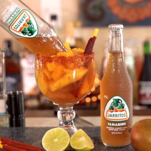 Jarritos Alcoholic Drink with bottles and glass to serve drink
